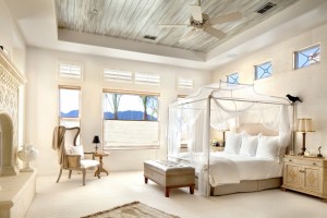 Superb-Darientel.Net-look-Los-Angeles-Mediterranean-Bedroom-Inspiration-with-bed-curtain-beige-armchair-beige-bed-beige-carpet-beige-leather-ottoman-beige-textured-wall
